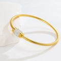 Elegant rose gold snake chain bracelet featuring a rotating cylinder pavé with sparkling crystals - Gold