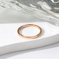 Minimalist rose gold stainless steel ring with a polished surface on white stone - US 5 / Rose Gold