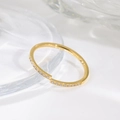 Minimalist gold-plated eternity ring with pavé cubic zirconia set on white background - US 5 / Gold