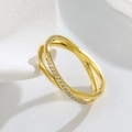 Macro view of interwoven gold-plated band with micro-pave zirconia setting - US 5 / Gold