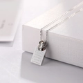 Minimalist silver steel necklace featuring a rectangular pendant with destiny engraving - Silver