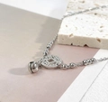 Titanium steel anklet with silver coin pendant and bell charm on a beaded chain - Silver