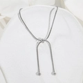 Detailed macro view of adjustable silver snake chain necklace with round sliding clasp bead - B139 Adjustable Anklet / Silver
