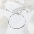 Adjustable silver stainless steel snake chain bracelet with bolo closure on white background - B138 Adjustable Bracelet / Silver