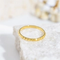 Close-up of golden geometric mosaic pyramid textured ring on a natural white stone base - US 7 / Pyramid Rivet Textured Style (B218)