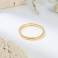 Detailed view of the faceted golden stainless steel ring showing geometric light reflections - US 7 / Rectangular Faceted Style (B219)