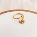 Close-up of gold open ring with hanging beads and smooth metallic reflective finish - Gold (B171)