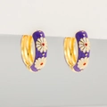 Macro shot of gold hoop earrings with purple enamel coating and white daisy flower details - Purple