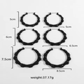 Set of three black bamboo texture hoop earrings in various sizes with weight info - Black Round (21343_4) / Black Bamboo Round Set (21343_4)