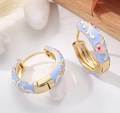Detail of vintage enamel hoop earrings with blue glaze and pink floral patterns - Light Blue