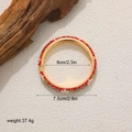 Detailed size view of red enamel flower bangle with 14K gold plating and spring closure - Cloisonne Red Bracelet SZ001_1