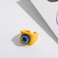 Detailed view of yellow resin open ring with blue evil eye charm and smooth finish - Open / Yellow
