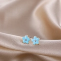 Close-up of blue floral enamel stud earrings with gold plating and zircon center - Blue Flower