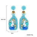 Détail de boucles d'oreilles bouteilles en perles bleues avec dimensions indiquées - Blue Bottle