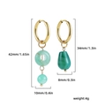 Detail view of asymmetric gold geometric earrings with green stone and size measurements - Turquoise Green