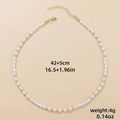 Détail du collier de perles montrant la longueur de 42 cm et le fermoir mousqueton ajustable - Style Perle de Riz (XL0191_2)