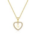 Detailed close-up of golden hollow heart necklace with sparkling zircon and letter O - Letter O(O)