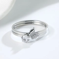 Detailed view of silver butterfly ring featuring a round zircon and matte metal texture - US 5 / Silver