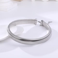 Polished silver stainless steel snake chain choker necklace on a minimalist ceramic plate - Choker 16mm / Silver