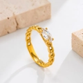 Chain link ring in 18K gold plated steel with marquise-cut zircon on beige stone base - US 7 / Gold - Marquise