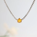 Detail of silver tennis necklace with square zircons and a pear-cut yellow gemstone pendant - Silver - Yellow Teardrop Zirconia