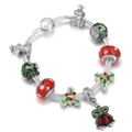 Close-up of Christmas themed charm bracelet with Santa tree and red bell pendants - Double-Strand Red Bell Christmas Style (005)
