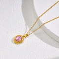 Detailed close-up of oval pink zircon pendant on a delicate gold-tone titanium steel chain - Gold - Pink Zirconia Clavicle Chain C55