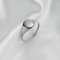 Detail of silver oval signet ring featuring delicate floral engravings on silk background - Silver Grass Style (C289)