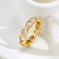 Macro detail of gold eternity ring featuring alternating pear and round-cut cubic zirconia - US 7 / Gold Round Waterdrop Rhinestone (C271)