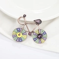 Vintage bronze bicycle brooch with purple crystals and colorful enamel wheel accents - Vintage Bicycle Style (胸针厂库)