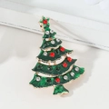 Spilla a forma di albero di Natale in smalto verde con strass su metallo dorato - Forma dell'albero di Natale