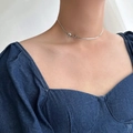 Silver bow choker necklace in 18K stainless steel worn on neck for a minimalist look - Silver Bow