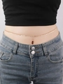 Detail of a gold layered waist chain featuring small round pendants on a model wearing denim - Round Discs (YL0005_4)