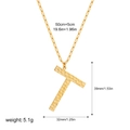 Detail of gold letter T pendant with hammered texture and 50cm pin style chain - Letter T