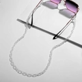 Detailed view of a transparent acrylic eyewear chain with modern flat-loop design links - Transparent (11263_4)