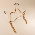 Detail of amber tortoiseshell acrylic eyeglass chain with oval links and gold frame glasses - Tortoise Shell Fine Chain (GC008_1)