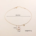 Dettaglio della collana vintage con pendente ovale in madreperla, rilievo e misure - Girasole