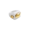 Macro detail of chunky white resin ring with polished gold-plated metal oval inlays - White (R286_3)