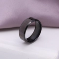 Black brushed stainless steel ring with polished beveled edges for men on white book - US 7 / Black