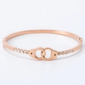 Elegant rose gold titanium steel handcuff bracelet with sparkling crystal accents - Rose Gold