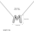 Polished silver bubble letter M pendant necklace with O-chain and dimensions - Letter M / Silver