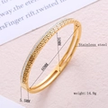 Gold stainless steel Greek key cuff bracelet with pavé crystal accents and hollow design - Gold