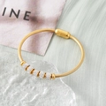 Gold-plated snake chain bracelet with six crystal-encrusted beads and magnetic clasp closure - Gold