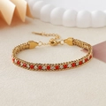 Bracelet ajustable en acier doré orné de cristaux de zircone rouges et blancs - Or + Strass Rouge et Blanc