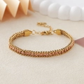 Elegant gold stainless steel bracelet with light pink cubic zirconia peach-tone crystals - Gold + Peach Rhinestone