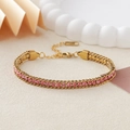 Elegant gold stainless steel bracelet with a dense row of pink round zircons - Gold + Pink Rhinestone