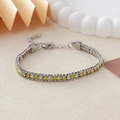 Bracelet double rangée en acier inoxydable avec zircons jaunes et blancs dorés - Acier + Strass Blanc et Jaune