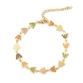 Golden stainless steel mushroom charm bracelet with colorful enamel dots and lobster clasp - Colorful Enamel Polka Dot Mushroom Bracelet