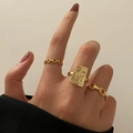 Three-piece gold ring set featuring abstract face relief and stylish chain link bands - Abstract Face Relief Gold Art Set (52102)