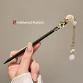 Handmade wooden hair stick with gold flower and long tassels in New Chinese style - Mortal Moon Style